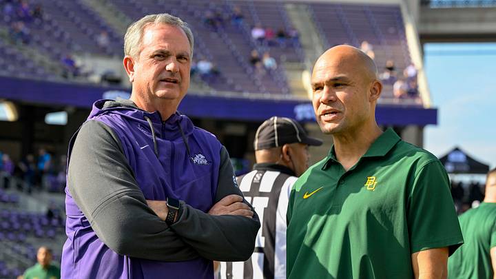 Nov 18, 2023; Fort Worth, Texas, USA; TCU Horned Frogs head coach Sonny Dykes (left) and Baylor Bears head coach Dave Aranda (right) before the game between the TCU Horned Frogs and the Baylor Bears at Amon G. Carter Stadium. Mandatory Credit: Jerome Miron-USA TODAY Sports Nov 18, 2023; Fort Worth, Texas, USA; TCU Horned Frogs head coach Sonny Dykes (left) and Baylor Bears head coach Dave Aranda (right) before the game between the TCU Horned Frogs and the Baylor Bears at Amon G. Carter Stadium. Mandatory Credit: Jerome Miron-USA TODAY Sports