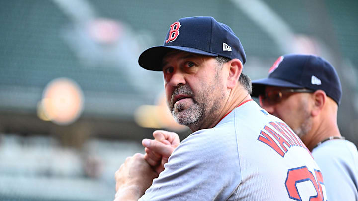 Aug 27, 2025; Baltimore, Maryland, USA; Boston Red Sox game planning and run prevention coach Jason Varitek (33) stands in the dugout before the game between the Baltimore Orioles and the Boston Red Sox at Oriole Park at Camden Yards. Mandatory Credit: James A. Pittman-Imagn Images Aug 27, 2025; Baltimore, Maryland, USA; Boston Red Sox game planning and run prevention coach Jason Varitek (33) stands in the dugout before the game between the Baltimore Orioles and the Boston Red Sox at Oriole Park at Camden Yards. Mandatory Credit: James A. Pittman-Imagn Images