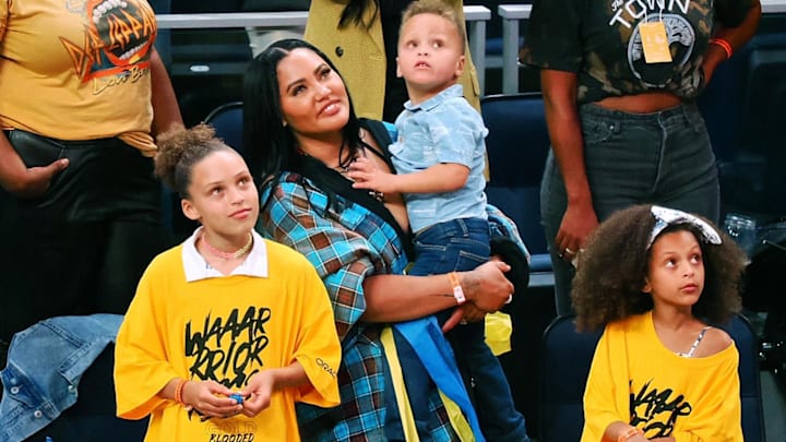 Ayesha Curry, wife of Golden State Warriors guard Stephen Curry (not pictured), with her children after winning game five of the 2022 western conference finals against the Dallas Mavericks.