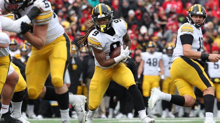 Nov 24, 2023; Lincoln, Nebraska, USA;  Iowa Hawkeyes running back Jaziun Patterson (9) carries the ball.