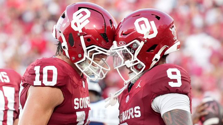 Oklahoma's Lloyd Avant (9) celebrates his touchdown with John Mateer (10) in the first half against UTEP. Oklahoma's Lloyd Avant (9) celebrates his touchdown with John Mateer (10) in the first half against UTEP.