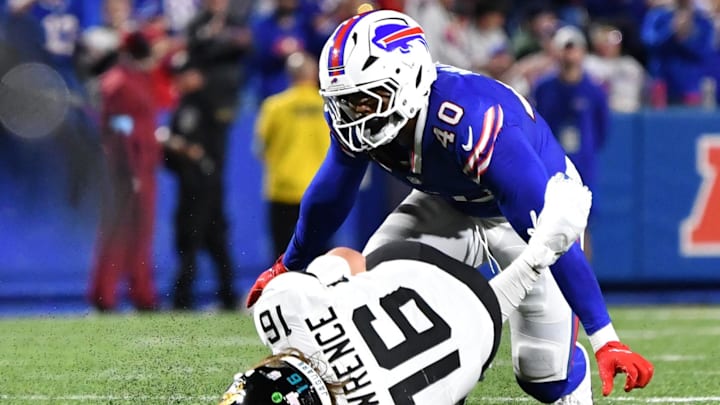 Sep 23, 2024; Orchard Park, New York, USA; Buffalo Bills linebacker Von Miller (40) sacks Jacksonville Jaguars quarterback Trevor Lawrence (16) in the fourth quarter at Highmark Stadium. Mandatory Credit: Mark Konezny-Imagn Images