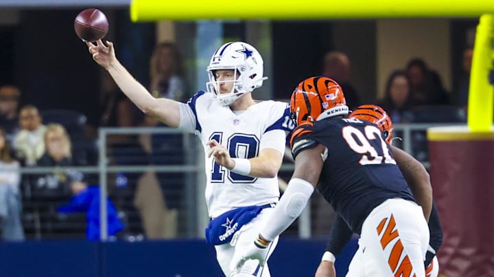 Dec 9, 2024; Arlington, Texas, USA; Dallas Cowboys quarterback Cooper Rush (10) throws as Cincinnati Bengals defensive tackle B.J. Hill (92) defends during the first half at AT&T Stadium. Mandatory Credit: Kevin Jairaj-Imagn Images Dec 9, 2024; Arlington, Texas, USA; Dallas Cowboys quarterback Cooper Rush (10) throws as Cincinnati Bengals defensive tackle B.J. Hill (92) defends during the first half at AT&T Stadium. Mandatory Credit: Kevin Jairaj-Imagn Images