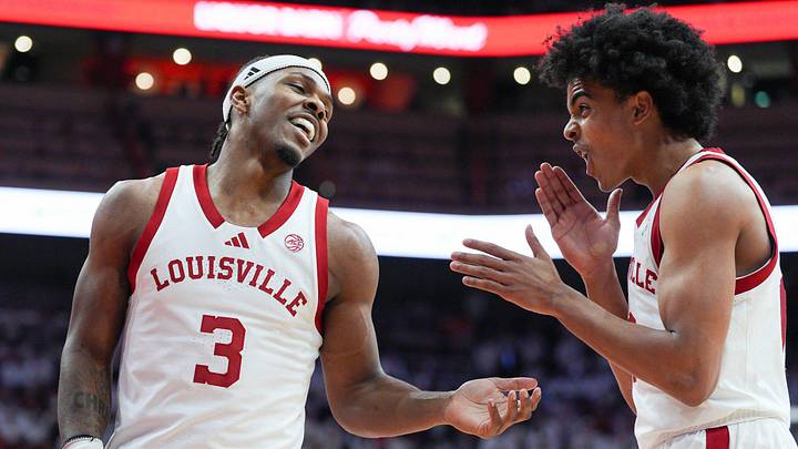 Louisville Cardinals guard Ryan Conwell (3) laughs with Louisville Cardinals guard Mikel Brown Jr. (0) in the first half at the KFC Yum! Center in downtown Louisville February 9, 2026. Louisville Cardinals guard Ryan Conwell (3) laughs with Louisville Cardinals guard Mikel Brown Jr. (0) in the first half at the KFC Yum! Center in downtown Louisville February 9, 2026.