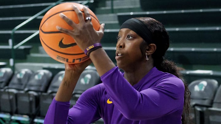 Nov 17, 2025; New Orleans, Louisiana, USA;  LSU Tigers guard Flau'Jae Johnson (4) warms up before a game against the Tulane Green Wave at Avron B. Fogelman Arena in Devlin Fieldhouse. Mandatory Credit: Matthew Hinton-Imagn Images