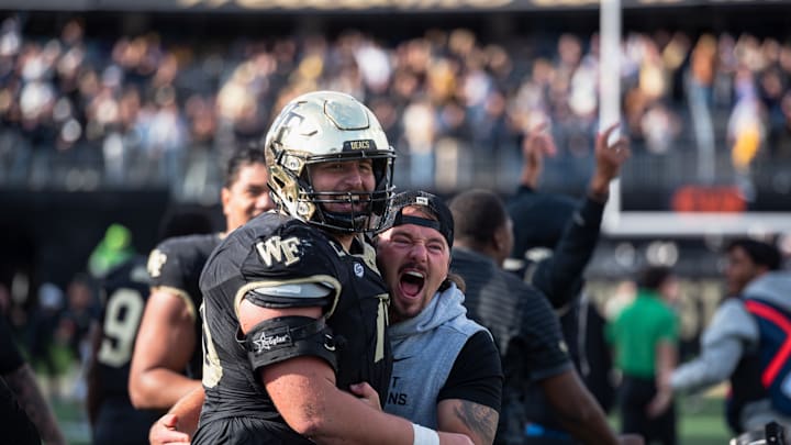 Wake Forest players and staff embrace after win over SMU Wake Forest players and staff embrace after win over SMU