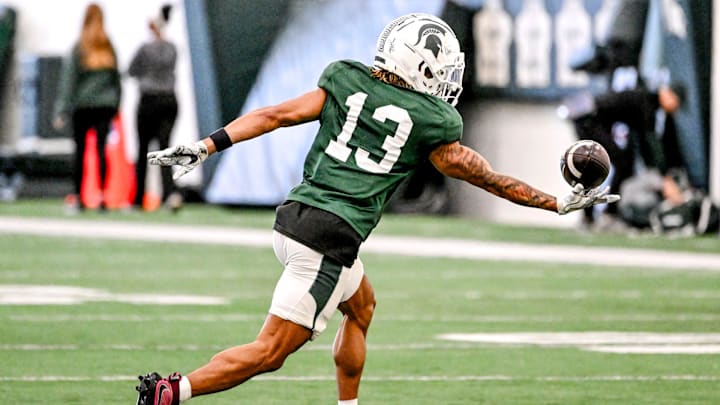 Michigan State receiver Chrishon McCray catches a pass during football practice on Tuesday, April 8, 2025, in East Lansing. Michigan State receiver Chrishon McCray catches a pass during football practice on Tuesday, April 8, 2025, in East Lansing.