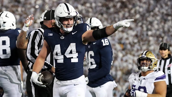 Penn State Nittany Lions tight end Tyler Warren (44) reacts after scoring a touchdown against the Washington Huskies during the second quarter at Beaver Stadium.