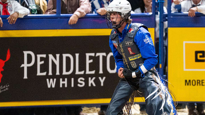 Stetson Wright celebrating after riding a bull at the 2025 NFR Stetson Wright celebrating after riding a bull at the 2025 NFR