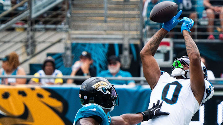 Jacksonville Jaguars linebacker Ventrell Miller (51) breaks up a pass intended for Carolina Panthers tight end Ja'Tavion Sanders (0) during the second quarter of an NFL football game between the Carolina Panthers at Jacksonville Jaguars at EverBank Stadium Sunday September 7, 2025. [Doug Engle/Florida Times-Union]