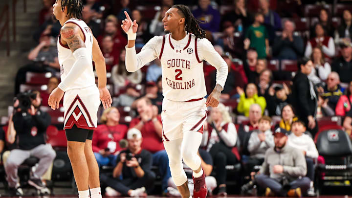 Dec 7, 2024; Columbia, South Carolina, USA; South Carolina Gamecocks guard Zachary Davis (2) celebrates a three point basket against the East Carolina Pirates in the second half at Colonial Life Arena. Mandatory Credit: Jeff Blake-Imagn Images