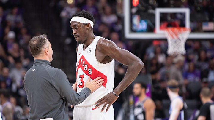 Jan 5, 2024; Sacramento, California, USA; Toronto Raptors head coach Darko Rajakovic speaks with Pascal Siakam