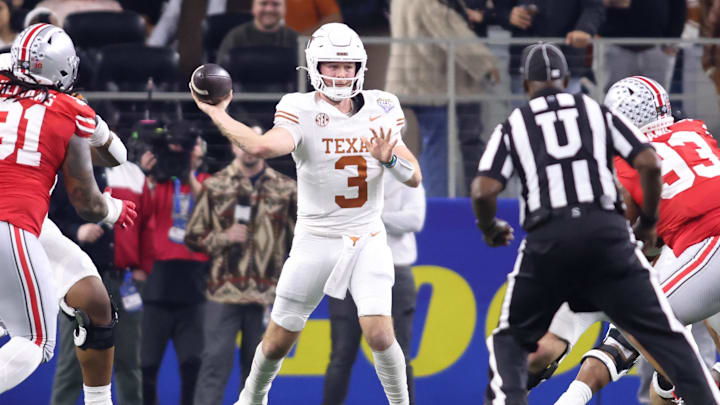 Jan 10, 2025; Arlington, Texas, USA; Texas Longhorns quarterback Quinn Ewers (3) throws during the second quarter of the College Football Playoff semifinal against the Ohio State Buckeyes in the Cotton Bowl at AT&T Stadium.