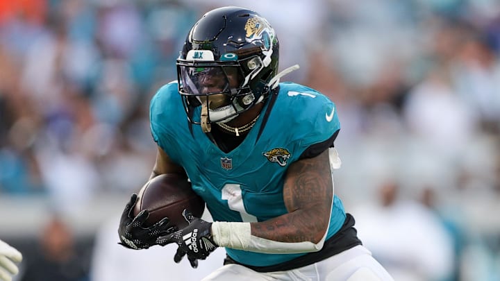 Aug 26, 2023; Jacksonville, Florida, USA;  Jacksonville Jaguars running back Travis Etienne Jr. (1).