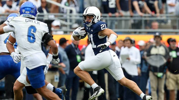 Penn State Nittany Lions running back Carson Hansen (21) runs with the ball against the Buffalo Bulls at Beaver Stadium. 