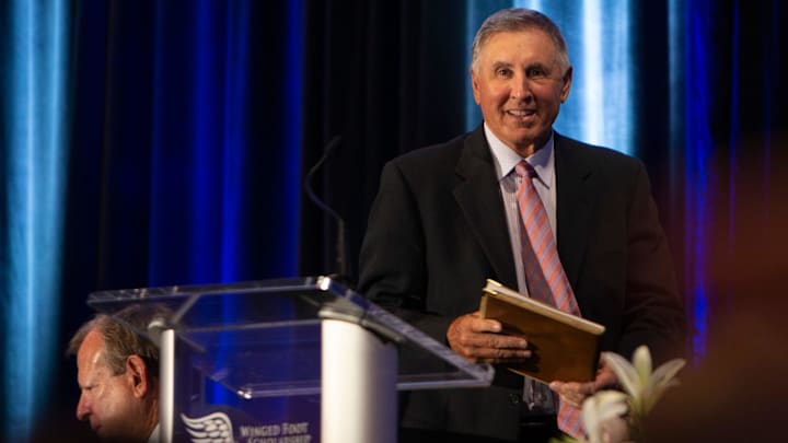 Gary Danielson gives the keynote speech during the Winged Foot Scholarship Awards Banquet, Thursday, May 26, 2022, at Naples Grande Beach Resort in Naples, Fla.

Lane Calkins of Naples High won the 2022 Winged Foot Scholar Athlete Award.