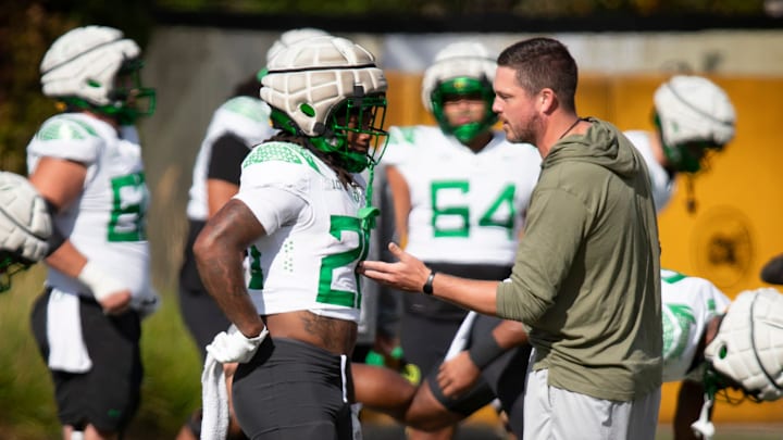 Oregon head coach Dan Lanning talks with running back Jordan James during practice with the Oregon Ducks Tuesday, Aug. 20, 2024 at the Hatfield-Dowlin Complex in Eugene, Ore.