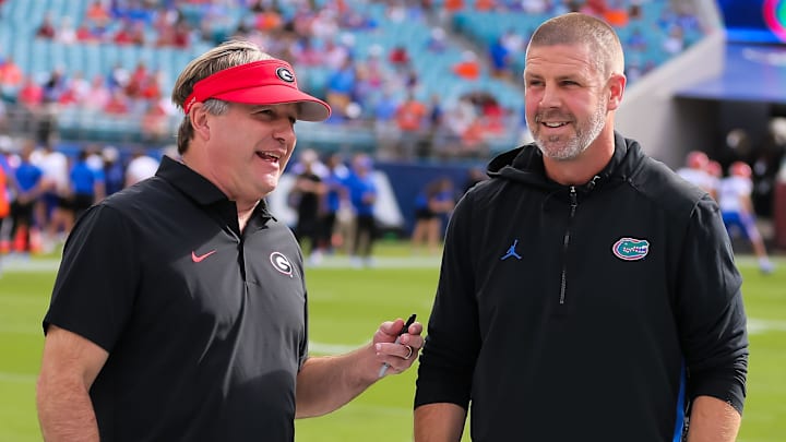Georgia Bulldogs head coach Kirby Smart and Florida Gators head coach Billy Napier talk before the game before the first half at EverBank Stadium in Jacksonville, FL on Saturday, November 2, 2024. [Doug Engle/Gainesville Sun]