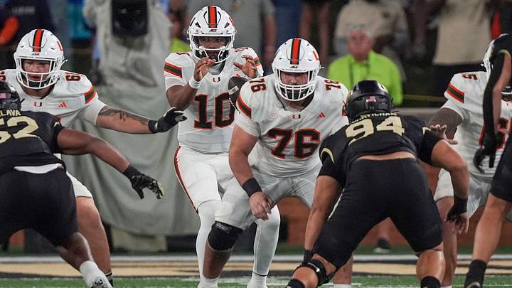 Sep 18, 2026; Winston-Salem, North Carolina, USA; Miami (FL) Hurricanes quarterback Darian Mensah (10) takes the snap from Miami (FL) Hurricanes offensive lineman Ryan Rodriguez (76) during the first half at Allegacy Federal Credit Union Stadium. Mandatory Credit: Jim Dedmon-Imagn Images Sep 18, 2026; Winston-Salem, North Carolina, USA; Miami (FL) Hurricanes quarterback Darian Mensah (10) takes the snap from Miami (FL) Hurricanes offensive lineman Ryan Rodriguez (76) during the first half at Allegacy Federal Credit Union Stadium. Mandatory Credit: Jim Dedmon-Imagn Images