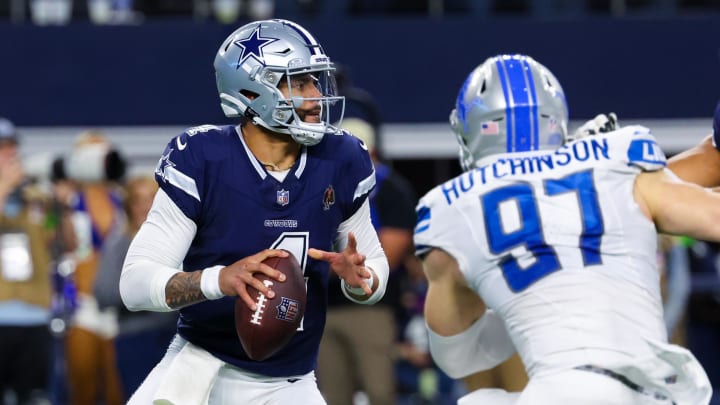 Dec 30, 2023; Arlington, Texas, USA; Dallas Cowboys quarterback Dak Prescott (4) throws as Detroit Lions defensive end Aidan Hutchinson (97) rushes during the second half at AT&T Stadium. Mandatory Credit: Kevin Jairaj-USA TODAY Sports