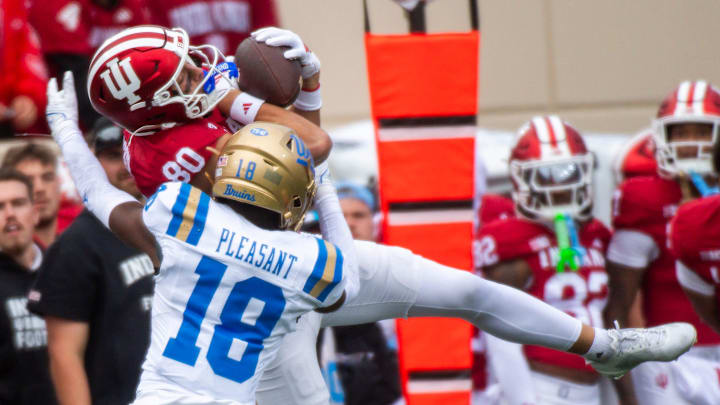 Indiana's Charlie Becker (80) makes the catch during the Indiana versus UCLA football game at Memorial Stadium on Saturday, Oct. 25, 2025. Indiana's Charlie Becker (80) makes the catch during the Indiana versus UCLA football game at Memorial Stadium on Saturday, Oct. 25, 2025.