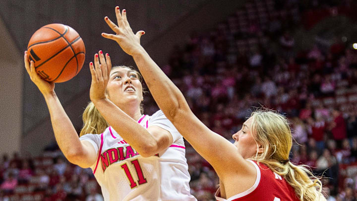 Indiana's Karoline Striplin (11) shoots over Nebraska's Alexis Markowski (40) during the Indiana versus Nebraska women's basketball game at Simon Skjodt Assembly Hall on Sunday, Feb. 2, 2025.
