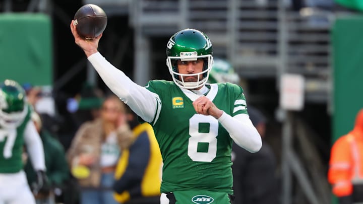 Jan 5, 2025; East Rutherford, New Jersey, USA; New York Jets quarterback Aaron Rodgers (8) throws a pass during pregame warmups for their game against the Miami Dolphins at MetLife Stadium. Mandatory Credit: Ed Mulholland-Imagn Images
