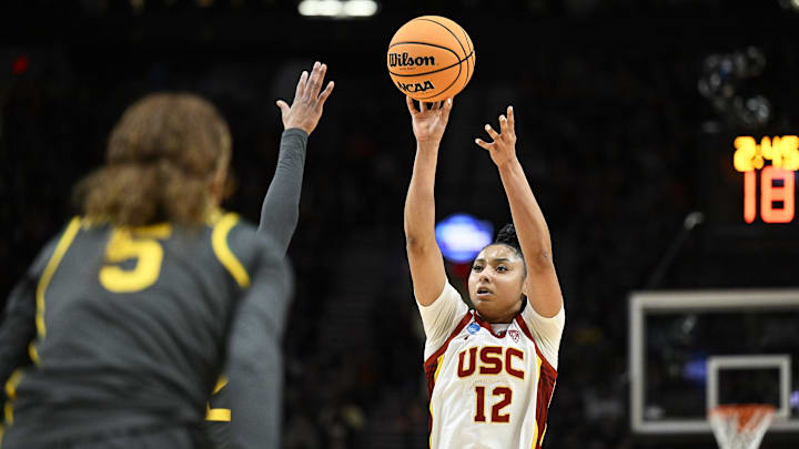 Mar 30, 2024; Portland, OR, USA; USC Trojans guard JuJu Watkins (12) shoots a jump shot during the second half against Baylor Lady Bears guard Darianna Littlepage-Buggs (5) in the semifinals of the Portland Regional of the 2024 NCAA Tournament at the Moda Center. Mandatory Credit: Troy Wayrynen-Imagn Images Mar 30, 2024; Portland, OR, USA; USC Trojans guard JuJu Watkins (12) shoots a jump shot during the second half against Baylor Lady Bears guard Darianna Littlepage-Buggs (5) in the semifinals of the Portland Regional of the 2024 NCAA Tournament at the Moda Center. Mandatory Credit: Troy Wayrynen-Imagn Images