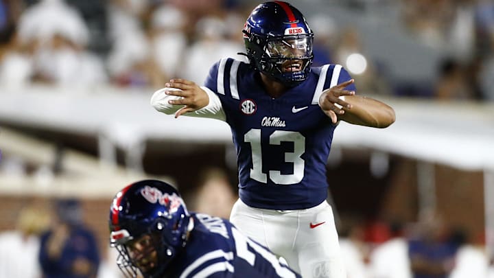 Aug 31, 2024; Oxford, Mississippi, USA; Mississippi Rebels quarterback Austin Simmons (13) gives direction prior to the snap against the Furman Paladins during the second half at Vaught-Hemingway Stadium. Mandatory Credit: Petre Thomas-Imagn Images