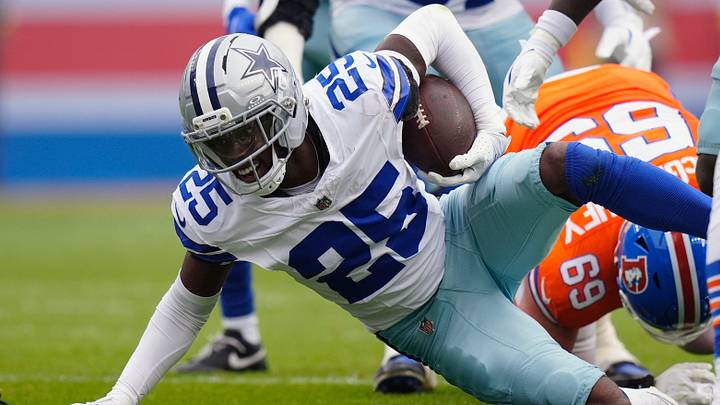 Oct 26, 2025; Denver, Colorado, USA; Dallas Cowboys cornerback Trikweze Bridges (25) intercepts the ball against the Denver Broncos in the first quarter at Empower Field at Mile High. Mandatory Credit: Ron Chenoy-Imagn Images
