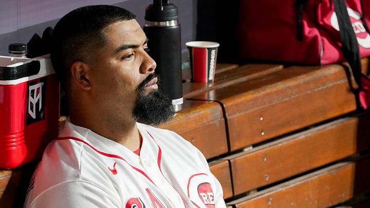 Cincinnati Reds pitcher Tony Santillan (64) looks on from the dugout after the Washington Nationals won 8-7 after ten innings, Wednesday, May 13, 2026, at Great American Ball Park in downtown Cincinnati. Cincinnati Reds pitcher Tony Santillan (64) looks on from the dugout after the Washington Nationals won 8-7 after ten innings, Wednesday, May 13, 2026, at Great American Ball Park in downtown Cincinnati.