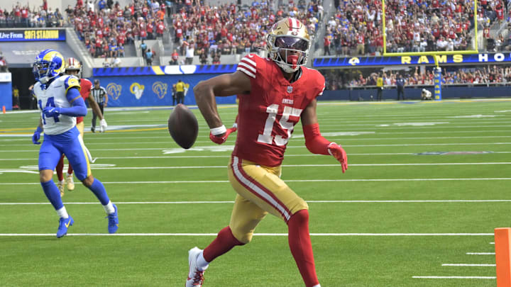 Sep 22, 2024; Inglewood, California, USA;  San Francisco 49ers wide receiver Jauan Jennings (15) flips the ball as he runs into the end zone for a touchdown in the second half against the Los Angeles Rams at SoFi Stadium. Mandatory Credit: Jayne Kamin-Oncea-Imagn Images
