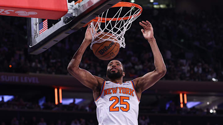 Jan 20, 2025; New York, New York, USA; New York Knicks forward Mikal Bridges (25) dunks the ball during the first half against the Atlanta Hawks at Madison Square Garden. Mandatory Credit: Vincent Carchietta-Imagn Images