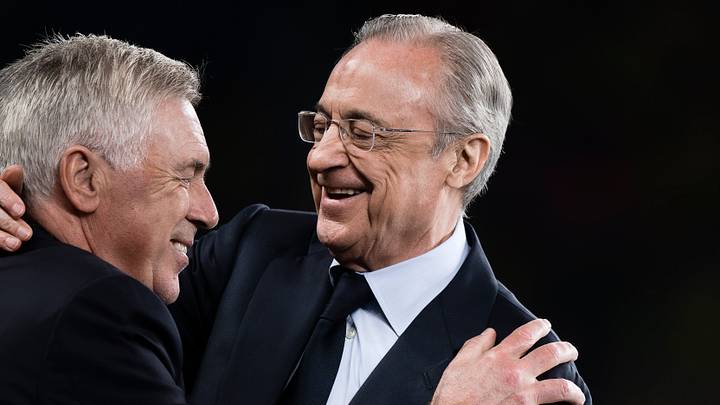 Florentino Perez (R), president of Real Madrid CF, hugs...