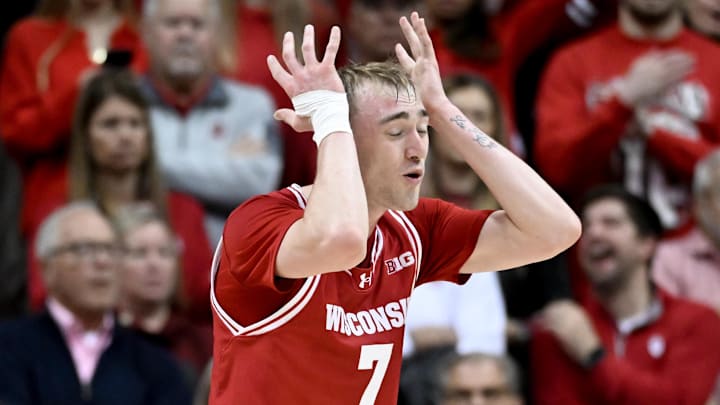 Feb 7, 2026; Bloomington, Indiana, USA; Wisconsin Badgers guard Andrew Rohde (7) reacts after a play against the Indiana Hoosiers during overtime at Simon Skjodt Assembly Hall. Mandatory Credit: Robert Goddin-Imagn Images
