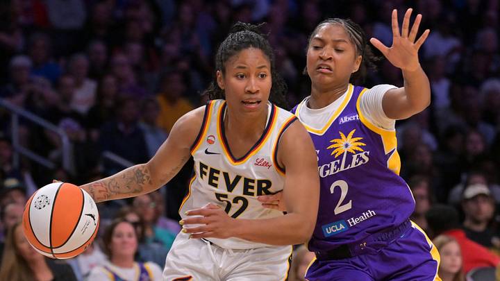 May 13, 2026; Los Angeles, California, USA; Indiana Fever guard Tyasha Harris (52) is defended by Los Angeles Sparks guard Chance Gray (2) in the second half at Crypto.com Arena. Mandatory Credit: Jayne Kamin-Oncea-Imagn Images