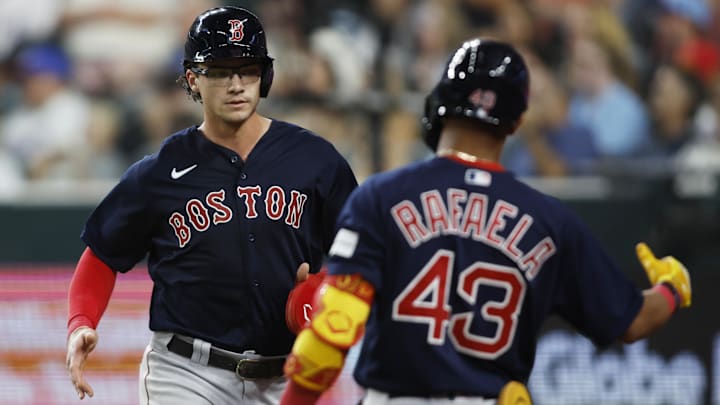 Sep 18, 2023; Arlington, Texas, USA; Boston Red Sox first baseman Bobby Dalbec (29) is congratulated