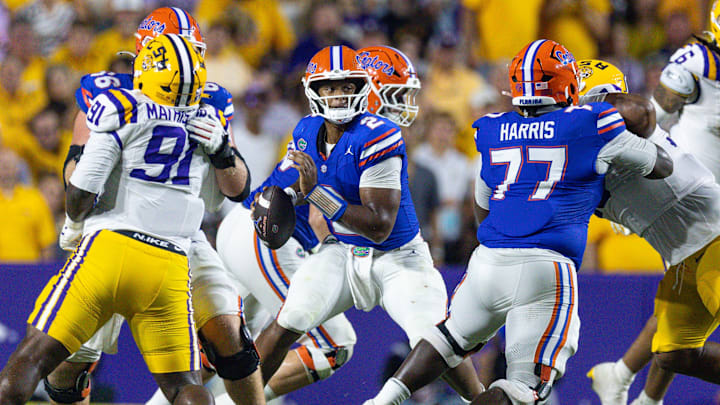Sep 13, 2025; Baton Rouge, Louisiana, USA; Florida Gators quarterback DJ Lagway (2) against LSU Tigers defensive tackle Walter Mathis Jr. (91) during the second half at Tiger Stadium. Mandatory Credit: Stephen Lew-Imagn Images Sep 13, 2025; Baton Rouge, Louisiana, USA; Florida Gators quarterback DJ Lagway (2) against LSU Tigers defensive tackle Walter Mathis Jr. (91) during the second half at Tiger Stadium. Mandatory Credit: Stephen Lew-Imagn Images