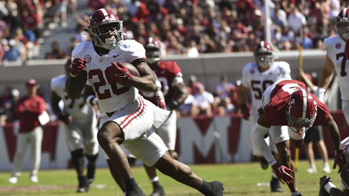 Apr 13, 2024; Tuscaloosa, AL, USA;  Alabama running back Jam Miller (26) breaks away from tacklers during the A-Day scrimmage at Bryant-Denny Stadium. Mandatory Credit: Gary Cosby Jr.-Imagn Images