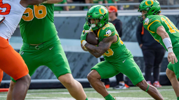Oregon running back Makhi Hughes carries the ball as the Oregon Ducks host the Oklahoma State Cowboys on Sept. 6, 2025, at Autzen Stadium in Eugene, Oregon.