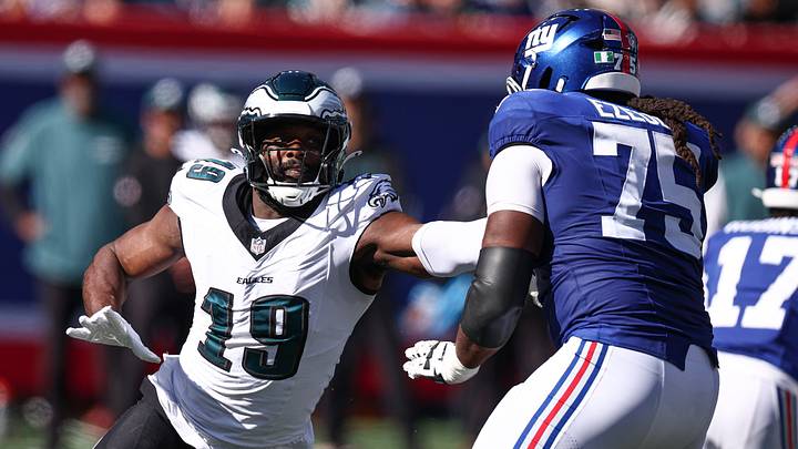 Oct 20, 2024; East Rutherford, New Jersey, USA; Philadelphia Eagles linebacker Josh Sweat (19) pass rushes against the New York Giants New York Giants guard Joshua Ezeudu (75) during the first half at MetLife Stadium. Mandatory Credit: Vincent Carchietta-Imagn Images