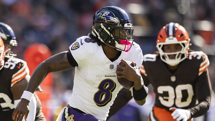 Oct 27, 2024; Cleveland, Ohio, USA; Baltimore Ravens quarterback Lamar Jackson (8) runs the ball against the Cleveland Brownsduring the second quarter at Huntington Bank Field.
