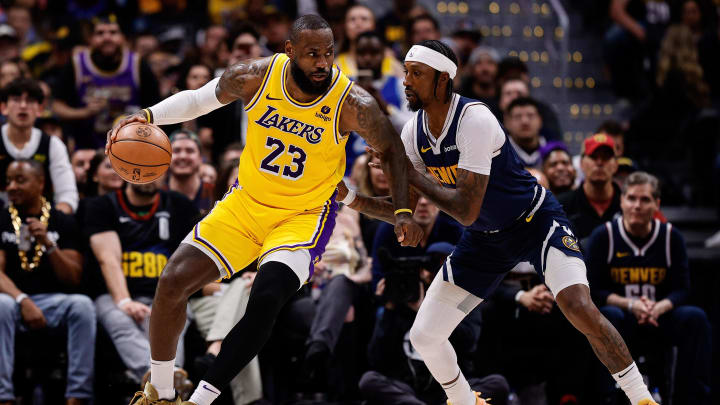 Apr 29, 2024; Denver, Colorado, USA; Los Angeles Lakers forward LeBron James (23) controls the ball as Denver Nuggets guard Kentavious Caldwell-Pope (5) guards in the third quarter during game five of the first round for the 2024 NBA playoffs at Ball Arena. Mandatory Credit: Isaiah J. Downing-USA TODAY Sports Apr 29, 2024; Denver, Colorado, USA; Los Angeles Lakers forward LeBron James (23) controls the ball as Denver Nuggets guard Kentavious Caldwell-Pope (5) guards in the third quarter during game five of the first round for the 2024 NBA playoffs at Ball Arena. Mandatory Credit: Isaiah J. Downing-USA TODAY Sports