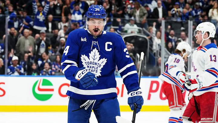 Oct 19, 2024; Toronto, Ontario, CAN; Toronto Maple Leafs center Auston Matthews (34) celebrates after scoring a goal against the New York Rangers during the third period at Scotiabank Arena. Mandatory Credit: Nick Turchiaro-Imagn Images