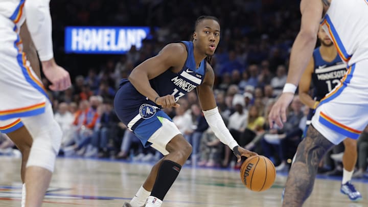 Mar 15, 2026; Oklahoma City, Oklahoma, USA; Minnesota Timberwolves guard Ayo Dosunmu (13) dribbles down the court against the Oklahoma City Thunder during the second half at Paycom Center. Mandatory Credit: Alonzo Adams-Imagn Images