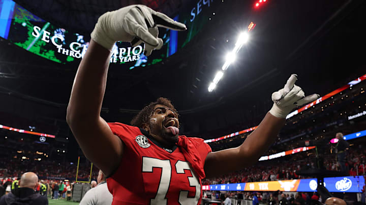 Dec 7, 2024; Atlanta, GA, USA; Georgia Bulldogs offensive lineman Xavier Truss (73) reacts after defeating the Texas Longhorns in overtime in the 2024 SEC Championship game at Mercedes-Benz Stadium. Mandatory Credit: Brett Davis-Imagn Images