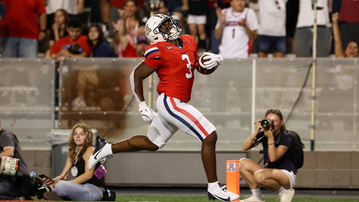 Sep 7, 2024; Tucson, Arizona, USA; Arizona Wildcats running back Kedrick Reescano (3) runs to the end zone to make a touch down against Northern Arizona Lumberjacks during the fourth quarter at Arizona Stadium. Mandatory Credit: Aryanna Frank-Imagn Images