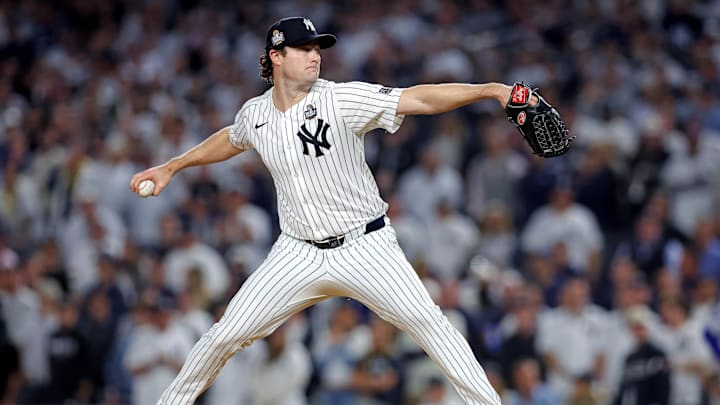 Oct 30, 2024; New York, New York, USA; New York Yankees pitcher Gerrit Cole (45) pitches during the first inning against the Los Angeles Dodgers in game four of the 2024 MLB World Series at Yankee Stadium. Mandatory Credit: Brad Penner-Imagn Images