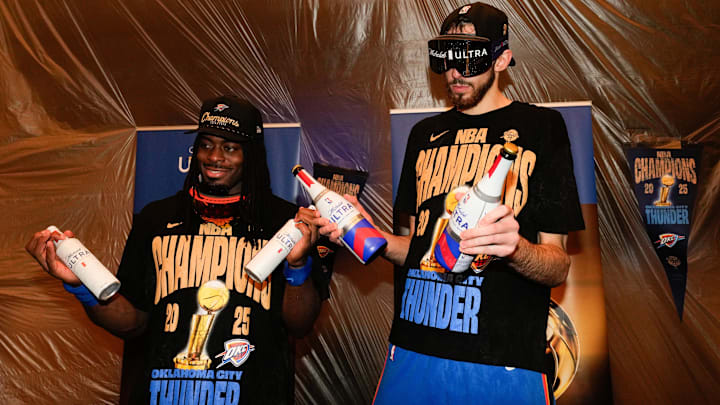 Jun 22, 2025; Oklahoma City, Oklahoma, USA; Oklahoma City Thunder guard Luguentz Dort (5) and forward Chet Holmgren (7) celebrate after winning game seven of the 2025 NBA Finals against the Indiana Pacers at Paycom Center. Mandatory Credit: Kyle Terada-Imagn Images Jun 22, 2025; Oklahoma City, Oklahoma, USA; Oklahoma City Thunder guard Luguentz Dort (5) and forward Chet Holmgren (7) celebrate after winning game seven of the 2025 NBA Finals against the Indiana Pacers at Paycom Center. Mandatory Credit: Kyle Terada-Imagn Images