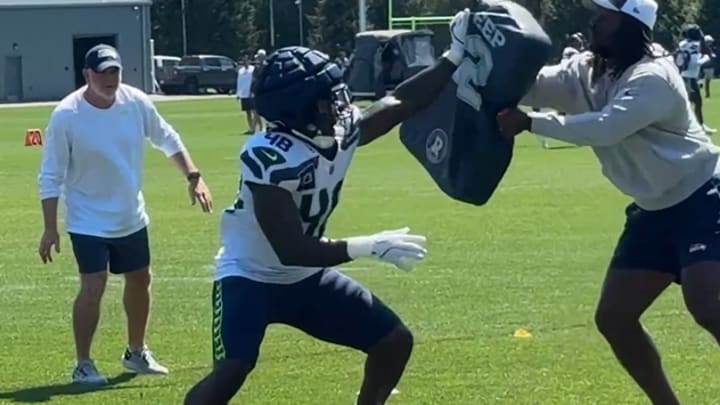 Tyrice Knight works on shedding blocks during a drill at Seattle Seahawks training camp. Tyrice Knight works on shedding blocks during a drill at Seattle Seahawks training camp.